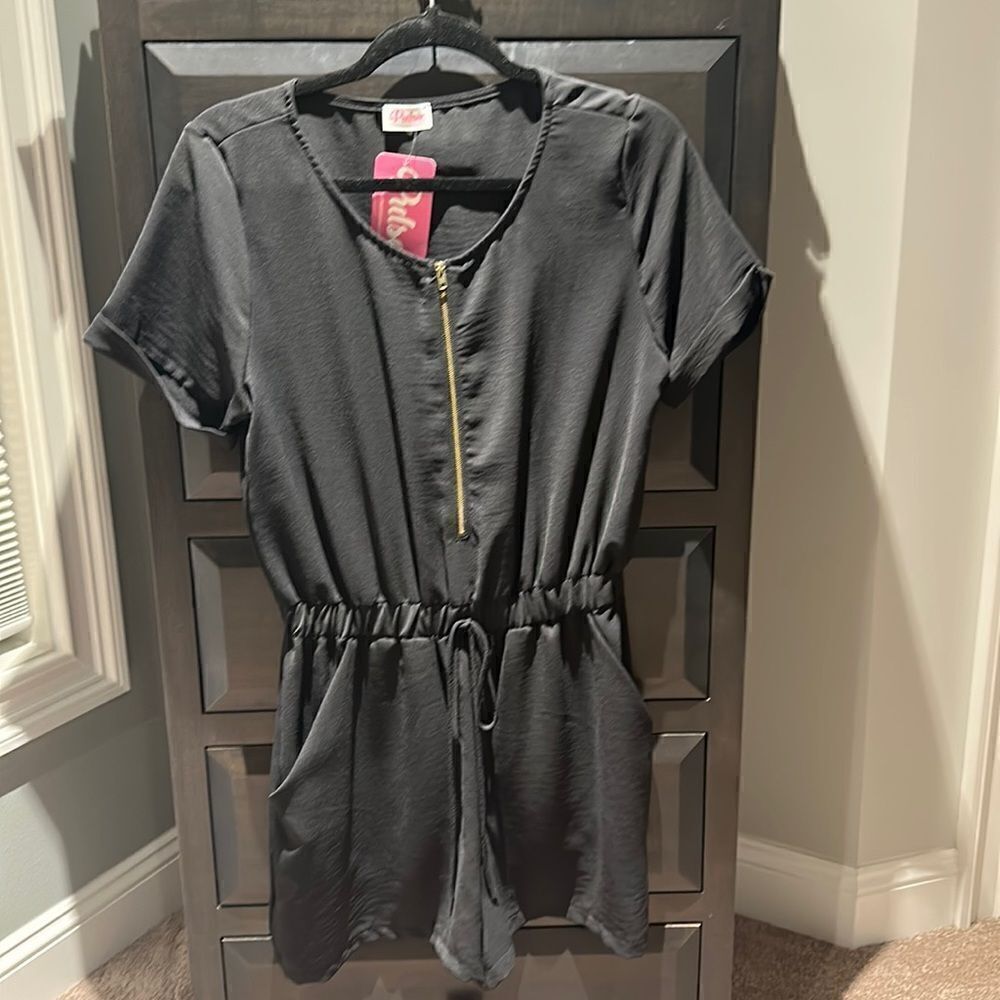 Black romper with shorts! Zipper front! Little cuff sleeves size medium